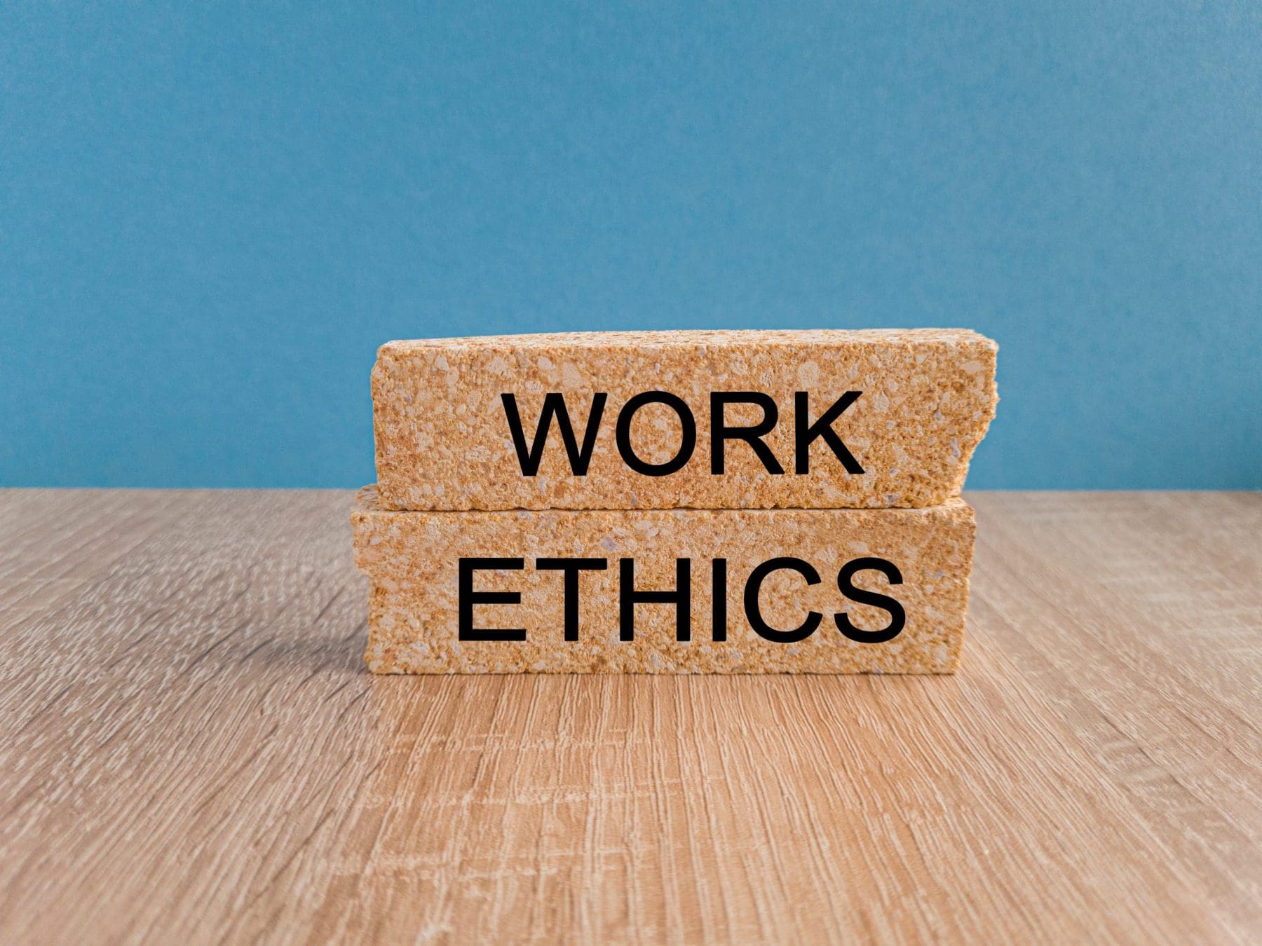 Work ethics symbol. Concept words Work ethics on brick blocks.