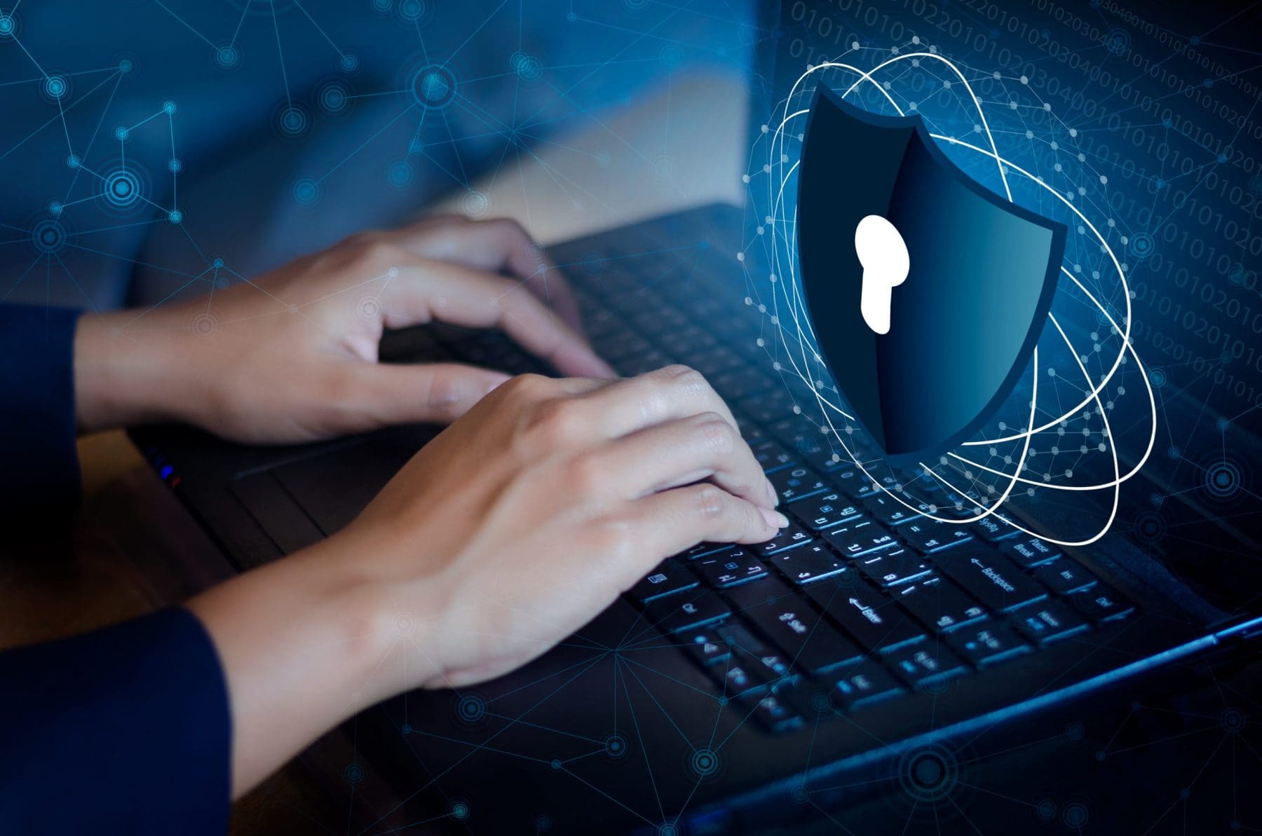 Lock on dark blue background with laptop, representing cybersecuriy.