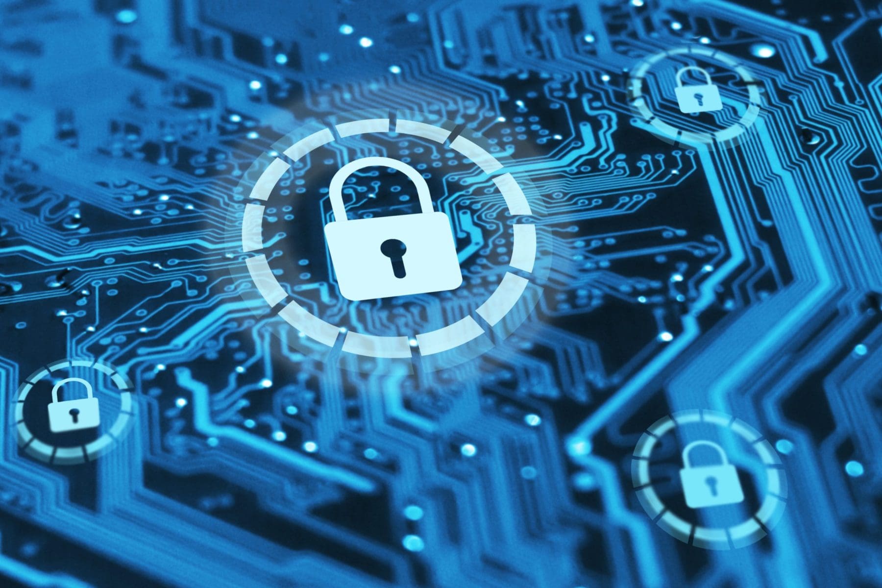 Cyber security and protection of private information and data concept. Locks on blue integrated circuit.